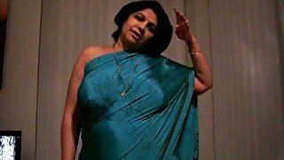 Mature Indian whore shows off her big tits and ass
