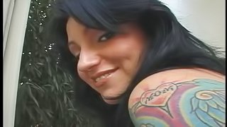 Tattooed brunette with big ass having her anal pounded hardcore