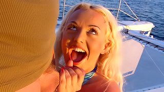 Fake tits blonde Jemstone giving dick handjob on the yacht