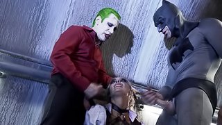 Joker and Batman team up and surround Harley Quinn with their cocks!