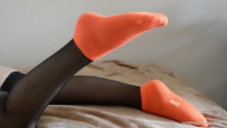 Orange cotton socks and black stockings