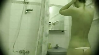 Sexy chick caught on a shower voyeur video