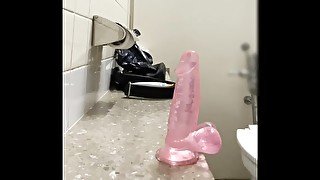 Dildo in anal in public toilet