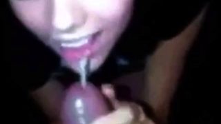 College girl gets on her knees to eat cum