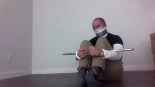 Handcuffed Tapegagged in a Turtleneck