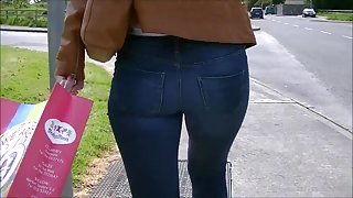 Candid ass in tight jeans tan leather jacket