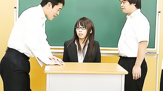 Petite Japanese teacher in glasses squirting heavily while being group fucked in the classroom