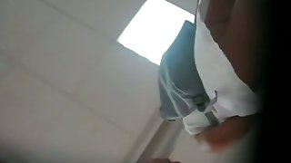Provocative ass in a white thong upskirt spy cam video