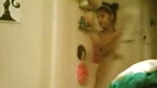 Hidden camera films amateur Indian girl in shower