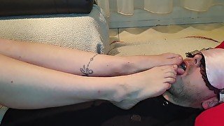 Femdom slave licks mistress feet