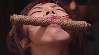 Hardcore rope play with a beautiful Japanese BDSM slut