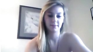 Hot blonde girl plays with her tits and masturbates her pussy with a toy