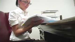 Hot chick in glasses gives footjob after teasing session
