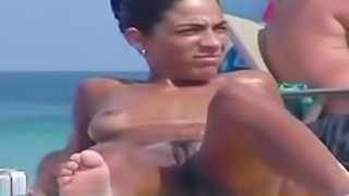 Naked women caught on a hidden cam on a nude beach