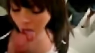 Hot brunette girl licking and sucking her boyfriend's cock