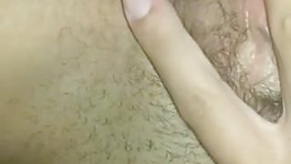 Sexy Girl Rubs Her Clit On Her Hairy Pussy