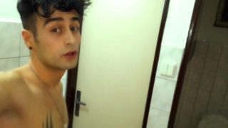 Twink risky jerks cock at the public toilet and cums on occupied cabin
