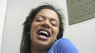 Ebony Brit in bra and miniskirt swallows cum after nasty blowjob in gloryhole