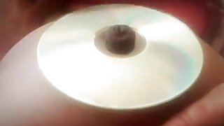 chubby girl bellybutton stuffing into a cd