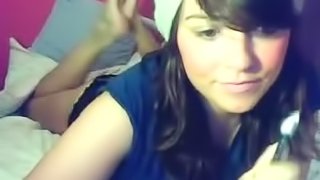 Pretty brunette teen shows her ass and tits on the webcam