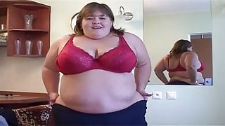 Young BBW strip teases