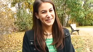 Slim brunette girl poses on camera and gets fucked outdoors