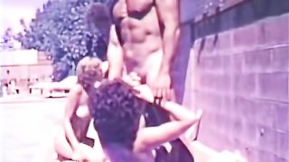 A group of free-lovers have a group fuck near a swimming pool