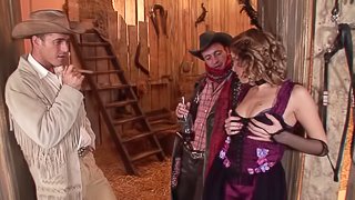 A couple of cowboys have a threesome with a chick in a barn
