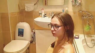 College Babe Giving Head in the Bathroom