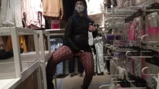 milf in ripped fishnets,rubs pussy in clothing store