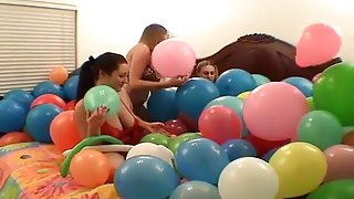 Three lesbains having sex with ballons