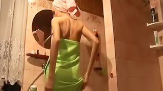 Horny blonde teen takes a shower in amateur solo clip