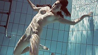 Amateur Russian babe Sima Lastova loves to be filmed nude in the pool