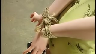 Divine redhead babe is being tortured by a military girl