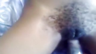 Jamaican girl gets her hairy pussy pov missionary fucked with condom on the bed