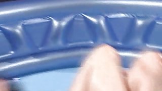 Wet brunette slut masturbating in the mini pool