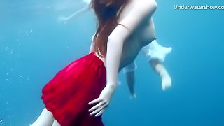 Natural tits lesbian teen diving seductively in cozy pool