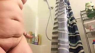 Chubby teen gets ready to take a shower