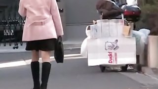 Cute Asian babe in a pink jacket gets a street sharking.