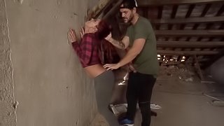 Nasty redhead chick gets stuffed by two guys at the abandoned house