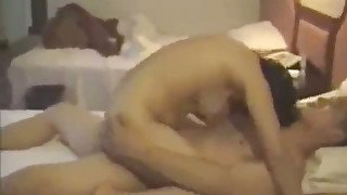 Chinese busty  girl in a hotel and man