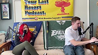 Motorcycle Model and Ugly white male hang out on couch. Your Last Resort Podcast Ep 58