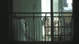 Voyeur captures the asian neighbors having sex in their apartment