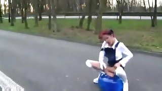 Girl is using a gym ball