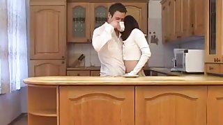 Couple have sex in the kitchen