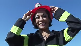 Firefighter slut lights studs fire with her hot body