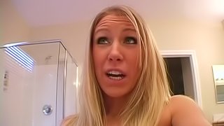 Amazing blonde shows off her adrenalizing pair of huge boobs