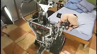Redhead slut and her Asian gal testing their sex machines
