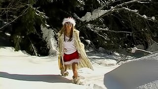 Amazing teen in a christmas mood masturbates warmly in this solo outdoors clip