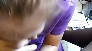 Blonde girl in purple dress sucks dick on her knees